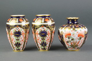 A pair of Royal Crown Derby Japan pattern oviform vases 3 1/4", a ditto baluster vase 3" 