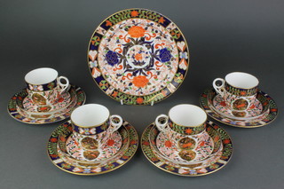 A Royal Crown Derby Japan pattern part tea set comprising 4 tea cups, 4 saucers, 4 small plates, 1 medium plate