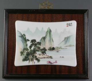 A 20th Century Chinese inverted rectangular porcelain panel painted with a mountainous landscape on a hardwood frame 8 1/2" x 6" 