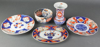 A 19th Century fluted Imari deep bowl decorated with flowers 3 1/2", a ditto vase, 2 plates and an oval stand