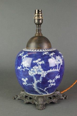 A prunus ginger jar converted to electricity with bronzed metal mounts 12" 