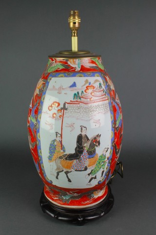 A Japanese baluster vase decorated with figures in procession on a band of exotic flowers converted to electricity 21"