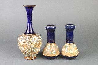 A pair of Doulton Silicon vases with tulip necks 6 1/2", a ditto vase with waisted neck 10"