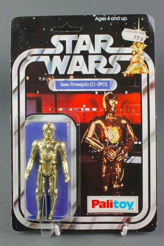 An original Star Wars C-3PO 12 back figure (SW 12B)  by Palitoy.  Carded, unpunched with original bubble intact and Goodacres price tag 