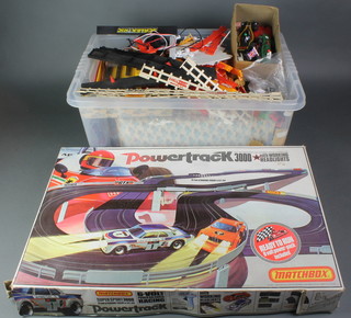A collection of various Scalextric including track, cars and accessories contained in a plastic crate together with Matchbox Powertrack 3000 boxed
