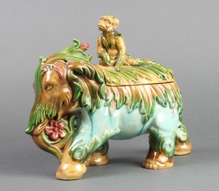 A Victorian Continental Majolica box and cover in the form of a monkey riding an elephant 11" 