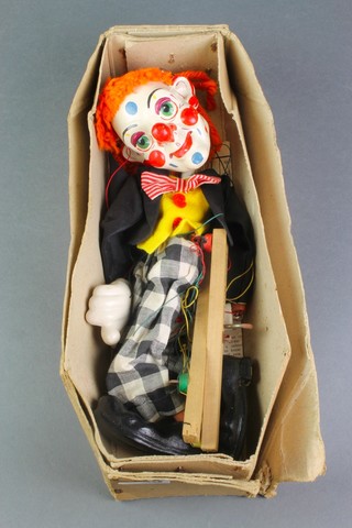 A Pelham Puppet of a clown 