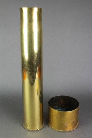 A Continental WWI brass shell case, the base marked August 1917 22"h and 1 other Continental shell case marked June 1918 