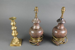 A pair of brass club shaped table lamps 14" together with a 19th Century brass candlestick 10 1/2" 