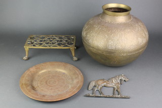 A rectangular pierced brass footman, an Indian oval embossed brass vase 11"h, ditto brass dish 10" and a figure of a standing horse 