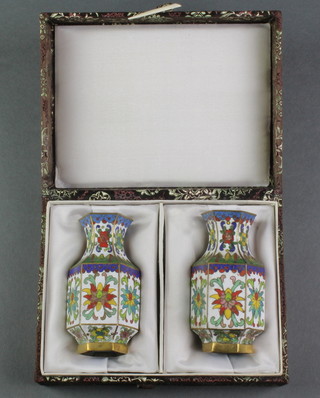 A pair of Japanese cloisonne enamelled vases of panelled club form 3 1/2", cased 
