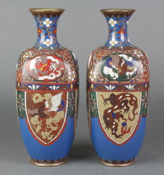 A pair of Japanese blue ground cloisonne enamelled vases of club form with panelled decoration 10" 