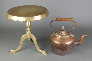 A 19th Century circular copper kettle with brass acorn finial 6" and a circular brass trivet in the form of a tea table 11" 