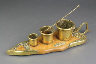 An Edwardian Art Nouveau brass and wooden 3 division cigar/cigarette/match stand in the form of a tobacco leaf, 13" together with an associated snuffer 