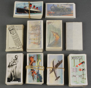 A quantity of various cigarette cards