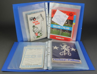 2 blue loose leaf albums of various football programmes from 1950's-70's 