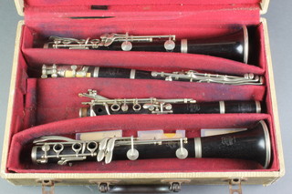A pair of Selmer A & B clarinets, cased 