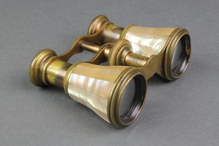 A pair of gilt metal and mother of pearl opera glasses