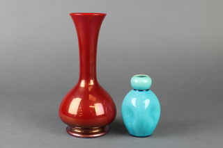 A Burmantofts turquoise dimpled vase  642 4" and a red glazed waisted necked ditto 3009 9" 