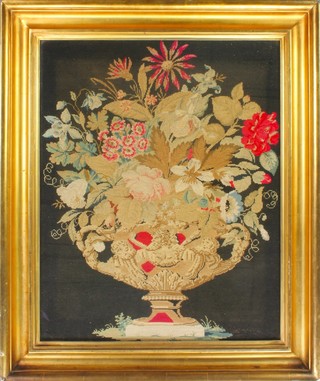 A Victorian Berlin woolwork panel, still life study of a vase of flowers 24" x 19 1/2" contained in a gilt frame 