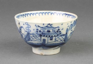 An 18th Century Delft tea bowl with a pavillion in a garden landscape with simple decoration to the interior 3 1/4" 
