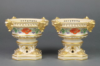 A pair of 19th Century Derby urn shaped dishes with mask handles and floral decoration on claw feet 4" 