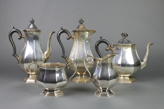 A 5 piece silver octagonal baluster tea and coffee set with ebony mounts, Sheffield 1925/1926, gross 2115 grams 