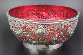 A good Chinese pierced and chased silver peony bowl, now with cranberry liner, import mark London 1898
