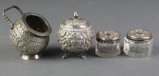 An Indian repousse silver salt and pepper and 2 silver mounted pots 