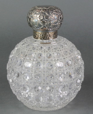 A Victorian silver mounted spherical scent bottle the repousse decoration with scrolling flowers, rubbed marks, 6 1/2" 