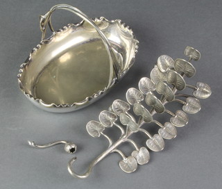 A silver plated novelty toast rack in the form of a sprig of leaves together with a plated dish