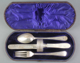 A Victorian cased silver 4 piece christening set, Sheffield 1872