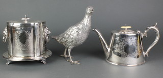 A silver plated figure of a quail, a ditto teapot and biscuit barrel 