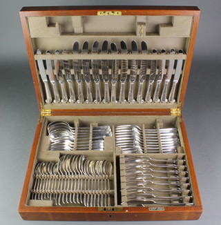 A cased canteen of silver rat tail cutlery comprising 8 teaspoons, 8 soup spoons, 8 dessert spoons, 4 serving spoons, 8 dessert forks, 8 dinner forks, 8 dessert knives, 8 dinner knives and 8 plated pairs of fish eaters, London 1970, 74 ozs 
