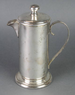 A stylish silver plated coffee pot 