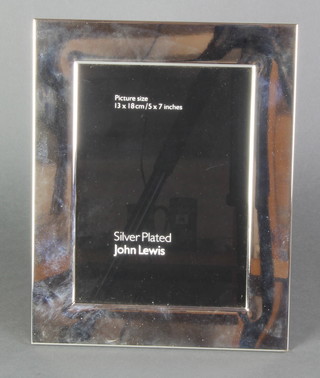A modern silver plated photograph frame