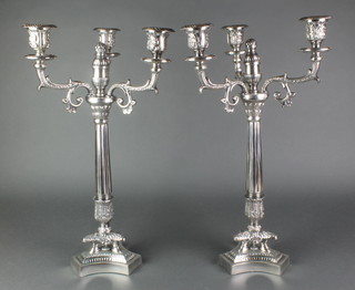 A pair of 3 light silver plated candelabra on triform bases 20" 