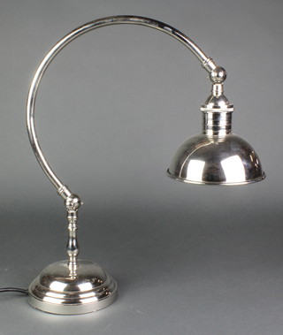 A silver plated students lamp on a circular base 16" 