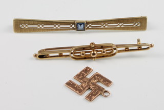 A 14ct aquamarine Art Deco bar brooch, a 15ct ditto and a 9ct gold pendant