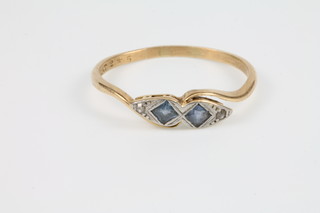 An 18ct yellow gold and platinum, sapphire and diamond ring, size U