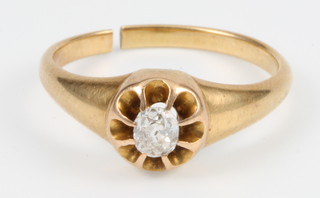 A gold single stone diamond ring, size L 1/2