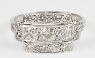 An 18ct white gold Art Deco style diamond ring 1.25ct, size O 1/2