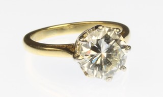 A fine 18ct yellow gold single stone brilliant cut, claw set diamond ring, approx 2.50ct. I/J. VS1. size J