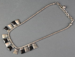 A silver and hardstone set necklace