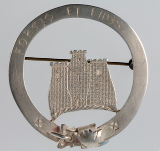 A pierced silver brooch 