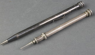 A silver plated Yard o'lead pencil and 1 other 