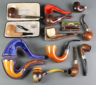 A cased silver mounted meerschaum pipe and minor pipes