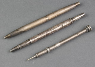A silver propelling pencil with hardstone end and 2 others
