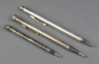 A silver propelling pencil and 2 plated ditto
