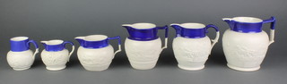 6 Victorian moulded jugs with rural decoration 